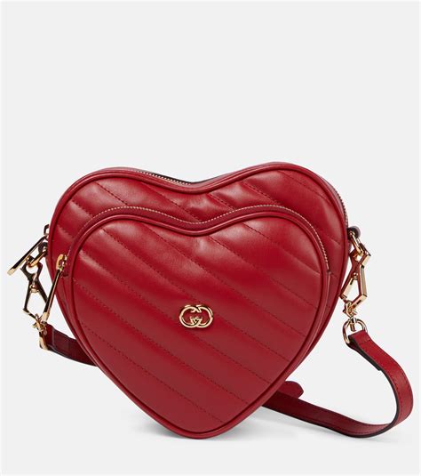 white gucci bag with heart on back|gucci interlocking bag small.